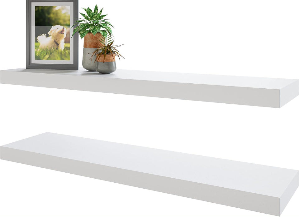 Set of two white floating wall shelves with decorative plant pots and framed photo on top, modern minimalist design for home storage and decor