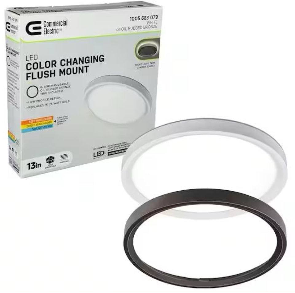 Open Box Commercial Electric 13-inch LED flush mount ceiling light with interchangeable white and oil rubbed bronze trims and adjustable color temperature.