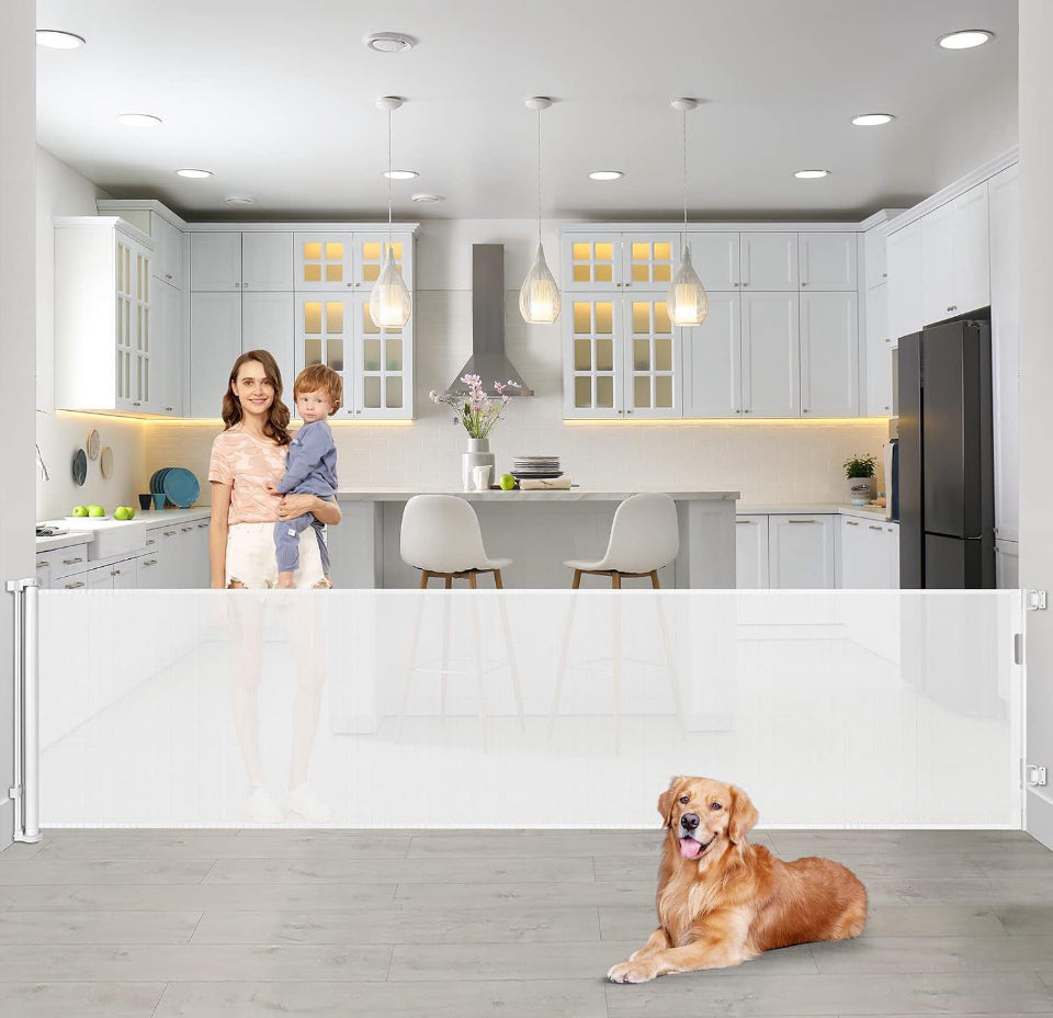 Bingguz 90 Inch retractable baby gate installed in a kitchen, featuring a woman holding a child with a dog nearby, ideal for wide doorways.