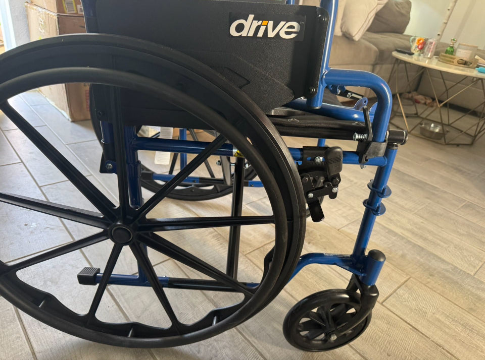 Open box new Drive Medical Blue Streak Wheelchair with Flip Back Desk Arms, Swing Away Footrests,FoldingDesk Length Arms, Alloy Steel, 20 Inch Seat