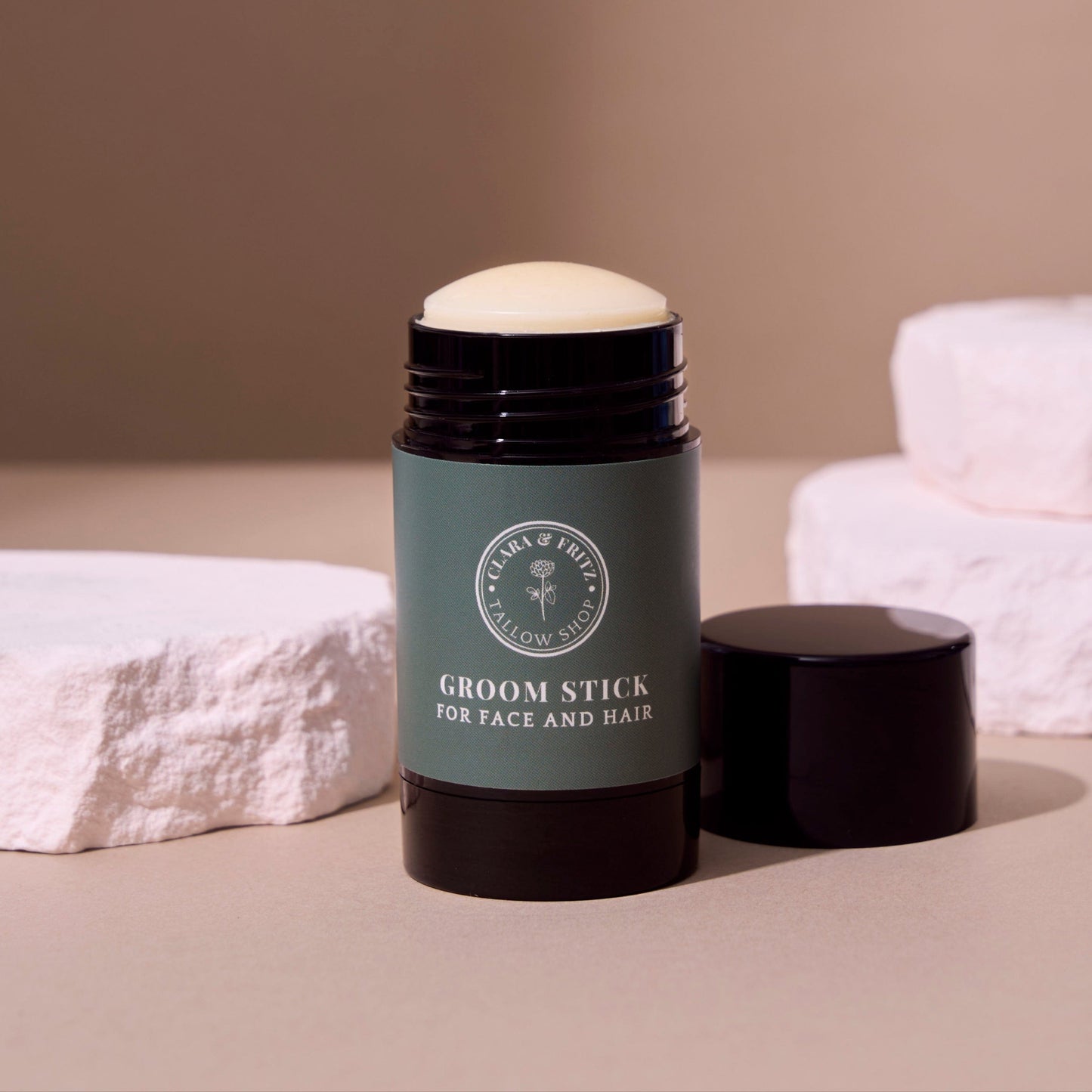 Groom Stick tallow balm in a travel-friendly stick for face and hair moisturizing and grooming
