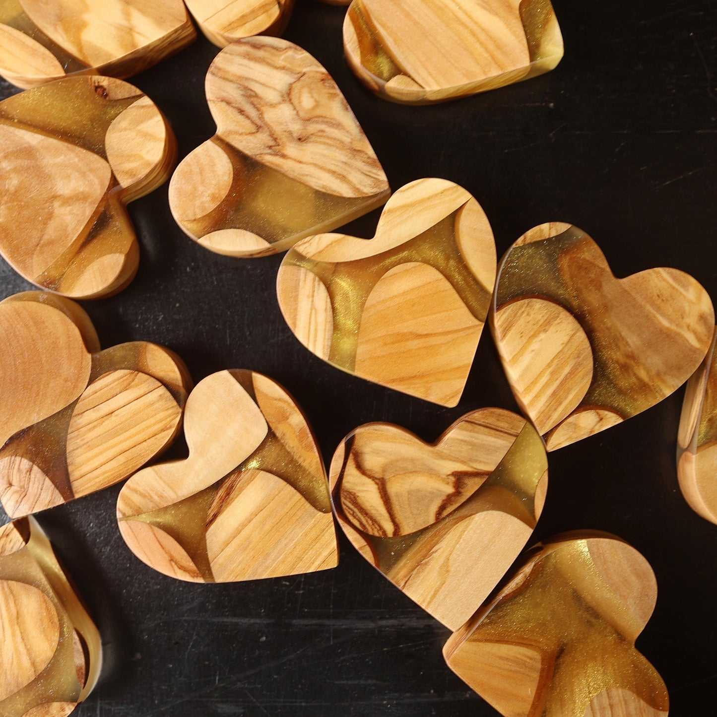 Handcrafted Olive & Gold Hearts made from authentic Bethlehem olive wood and shimmering gold resin, symbolizing eternal love and hope.