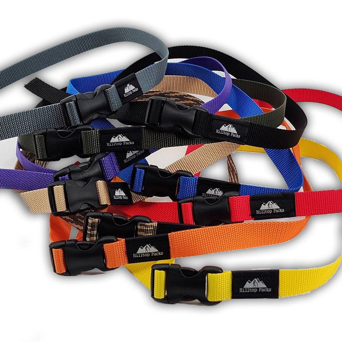 Collection of colorful ultralight hiker belts with YKK buckles in various colors including gray, blue, purple, beige, black, red, orange, and yellow