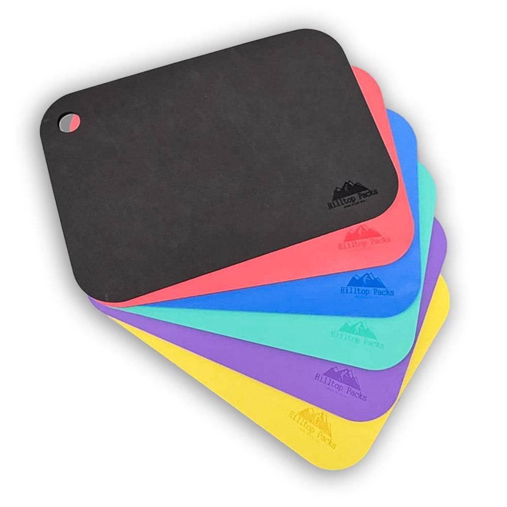 Colorful ultralight Hilltop Packs sit pads made of durable USA cross linked polyethylene foam