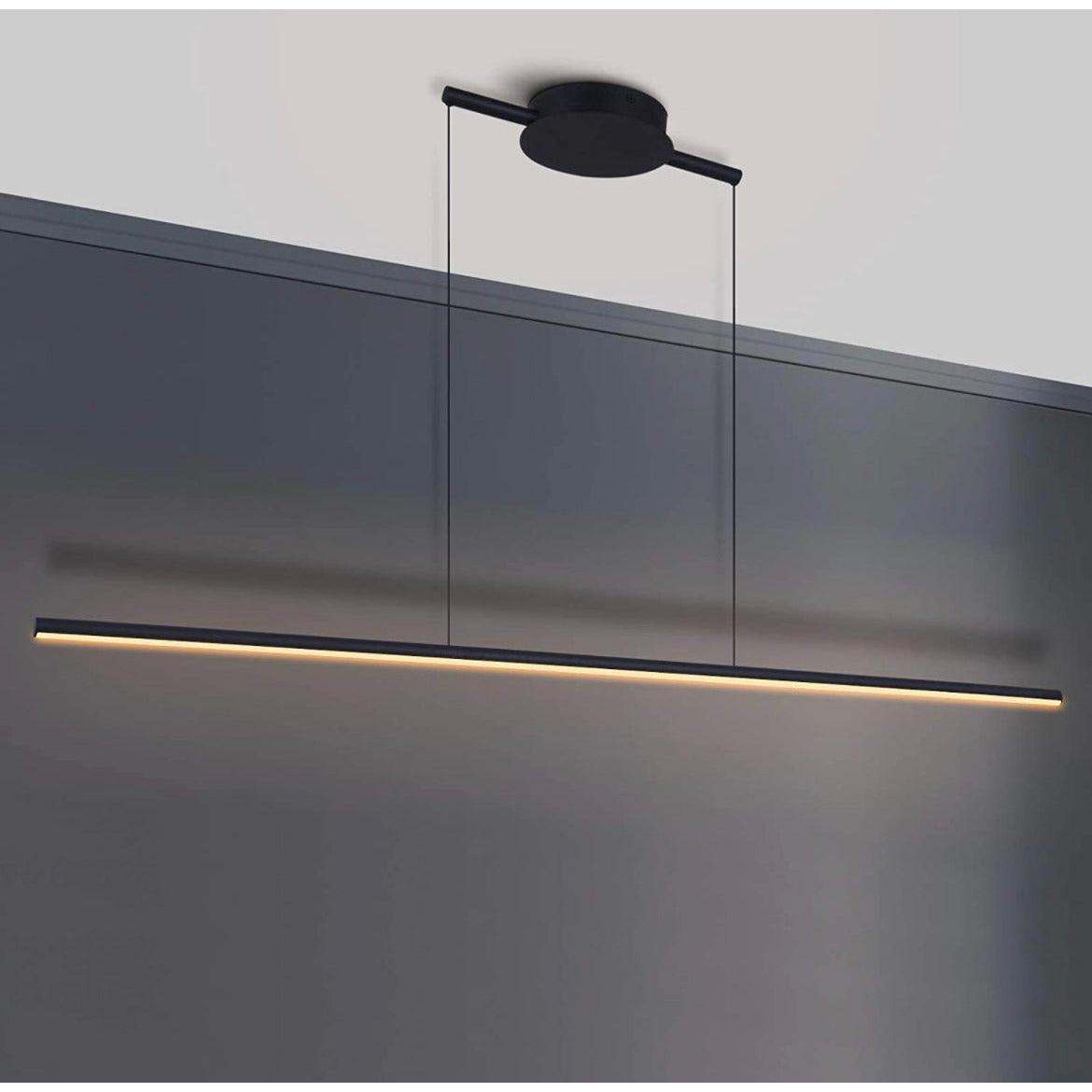 Modern black kitchen island pendant lighting with linear 40.94-inch dimmable warm LED light fixture hanging from ceiling
