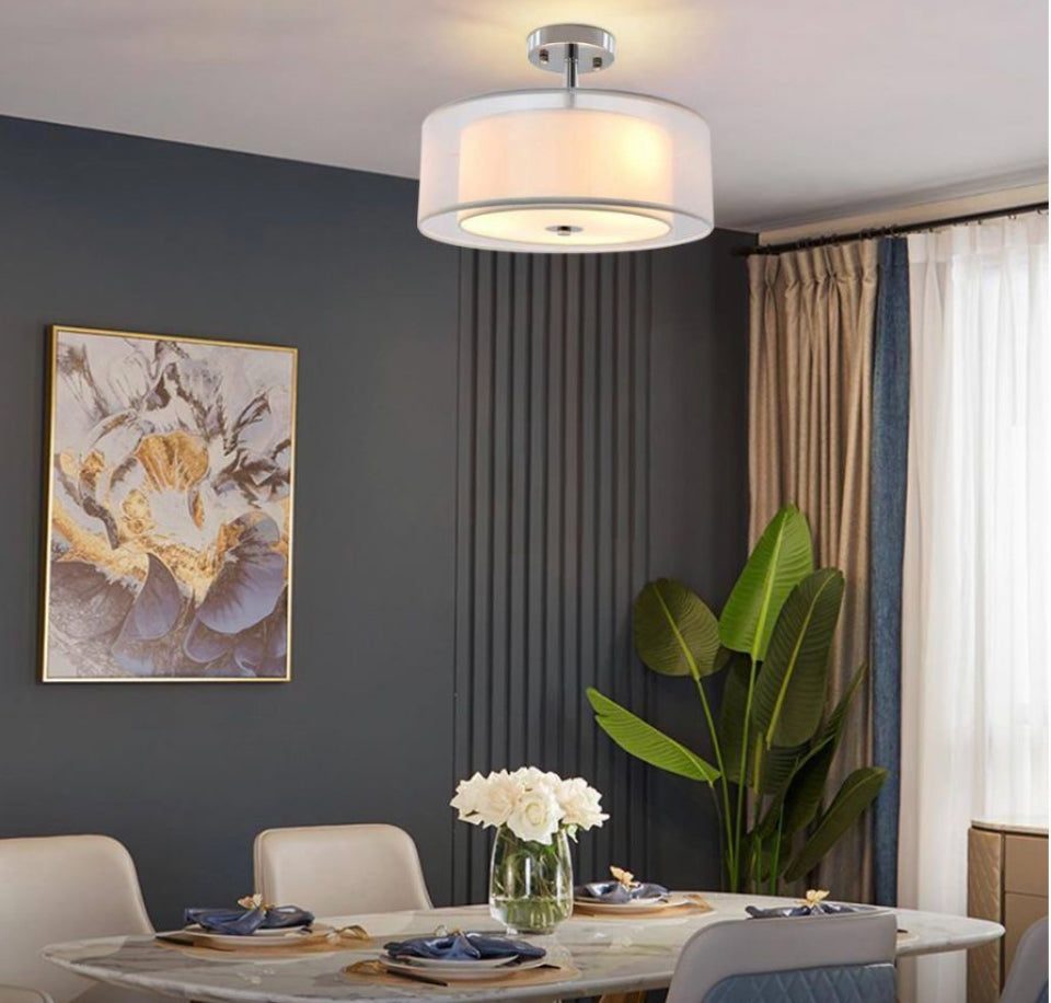Depuley 15 in. 3-light industrial semi drum flush mount light over elegant dining table.