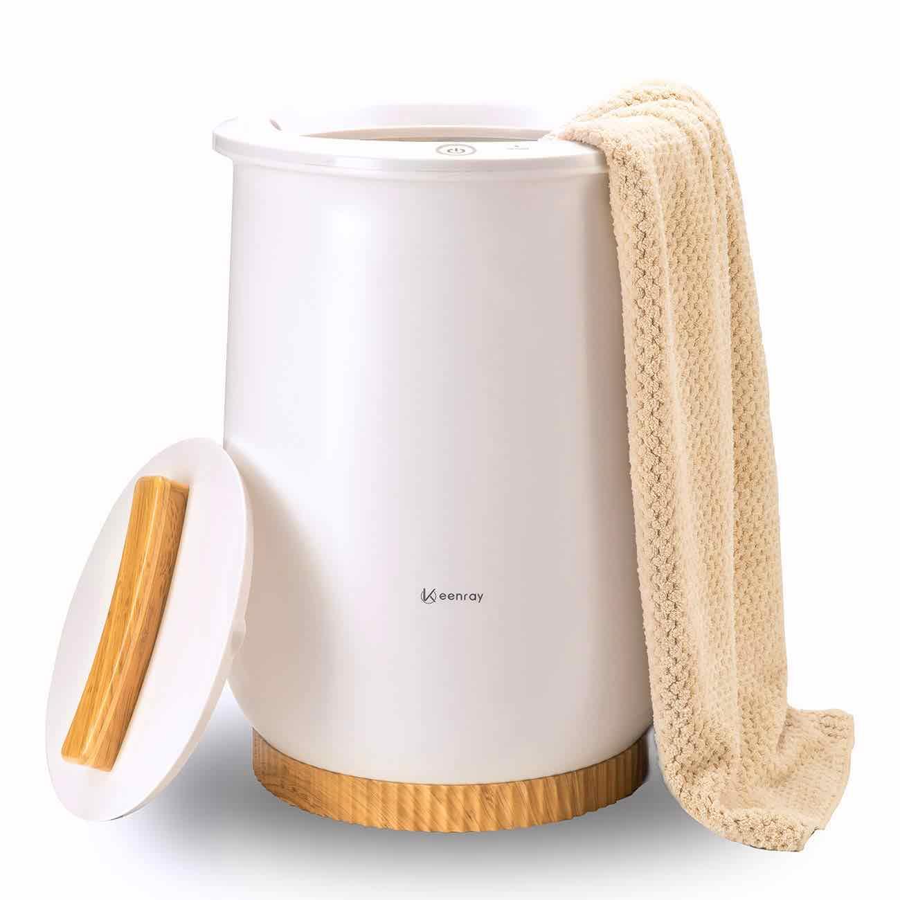 Luxury bucket towel warmer with a sleek design, suitable for large towels and bathrobes, featuring auto shut-off and rapid heat-up.
