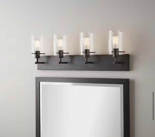 Hampton Bay Regan 4-light matte black bathroom vanity light with clear glass shades