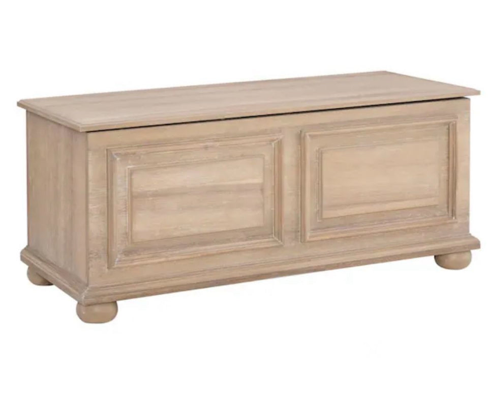 Powell Company Rockland natural finish cedar chest with raised panels and bun feet for storage and rustic decor