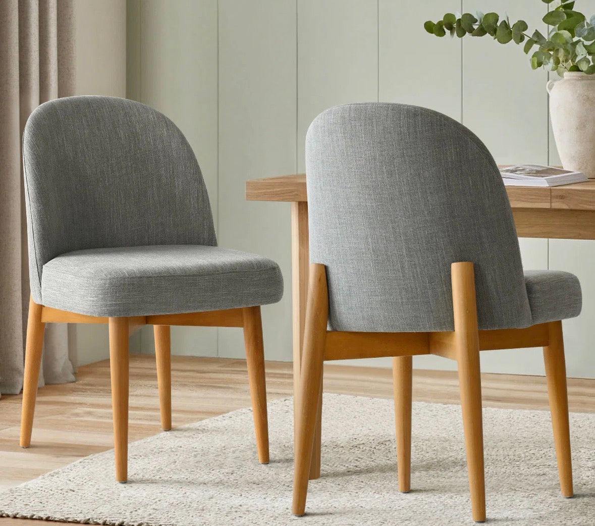 Set of 2 George Oliver linen upholstered parson chairs with solid rubber wood legs in olive green.
