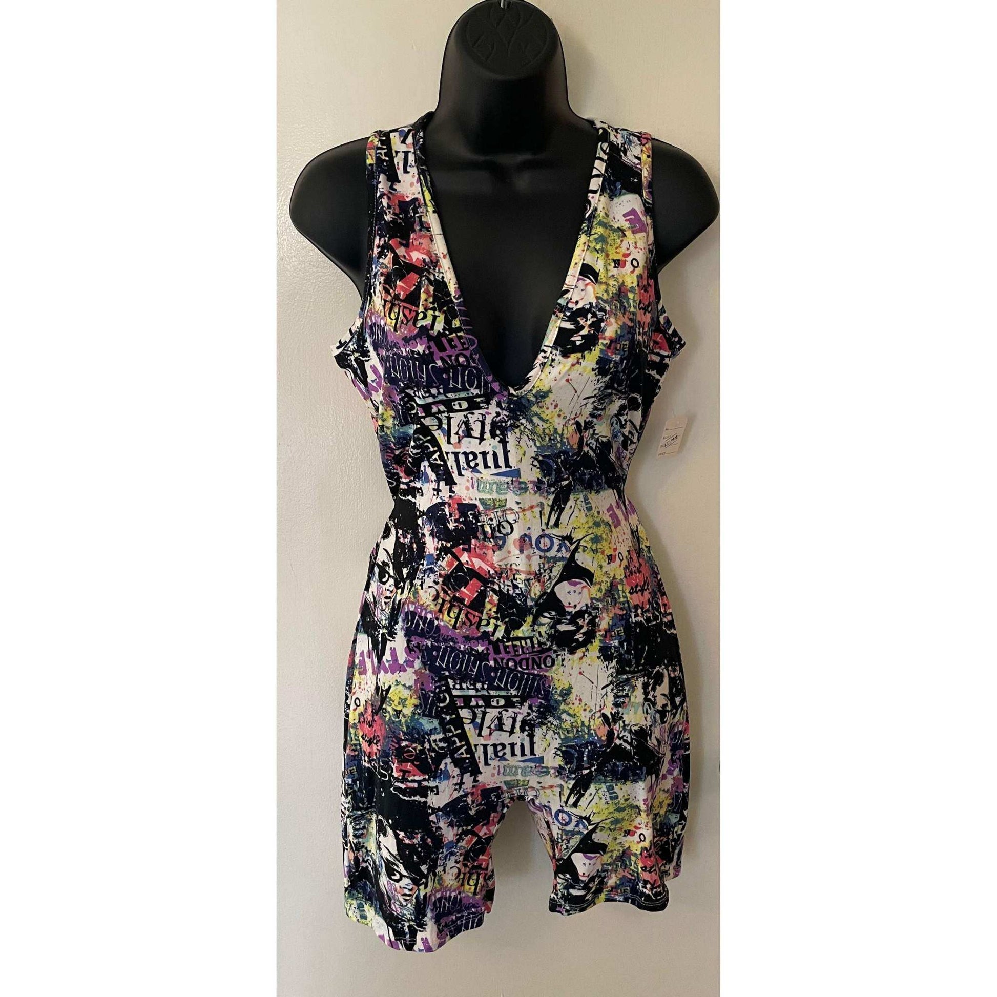 colorful printed Dodo Romper One Piece with deep V-neck on black mannequin