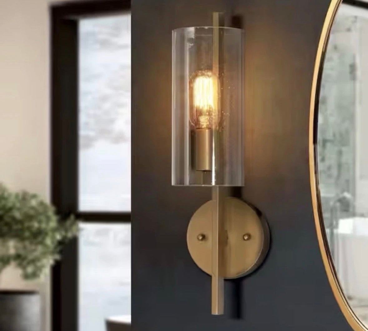 Uolfin 17 in H modern brass gold cylinder powder room wall sconce with seeded glass shade