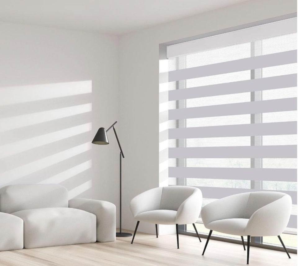 SUNFREE zebra blinds in light grey installed in a modern living room with neutral decor.