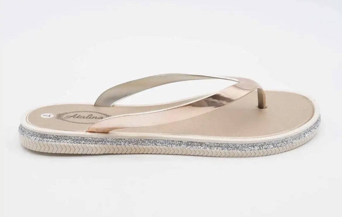 Women's Atalina Sandals in rose gold and silver glitter, thong flip flop style with flat heel.