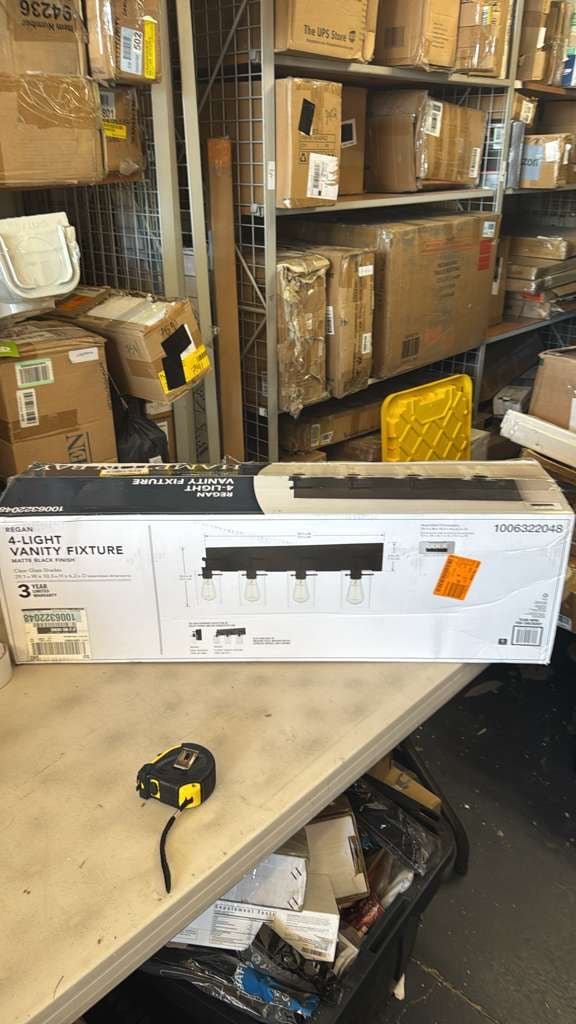 Hampton Bay  Regan 29.25 in. 4-Light Matte Black Bathroom Vanity Light with Clear Glass Shades