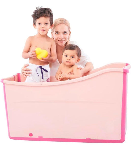Large foldable pink toddler bathtub with a mother and two children inside, designed for safe and portable bath time.