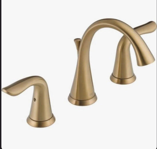 Delta Lahara brushed gold 3-hole widespread bathroom faucet with pop-up drain in champagne bronze