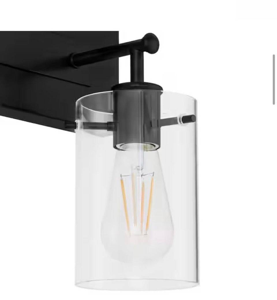 Hampton Bay  Regan 29.25 in. 4-Light Matte Black Bathroom Vanity Light with Clear Glass Shades