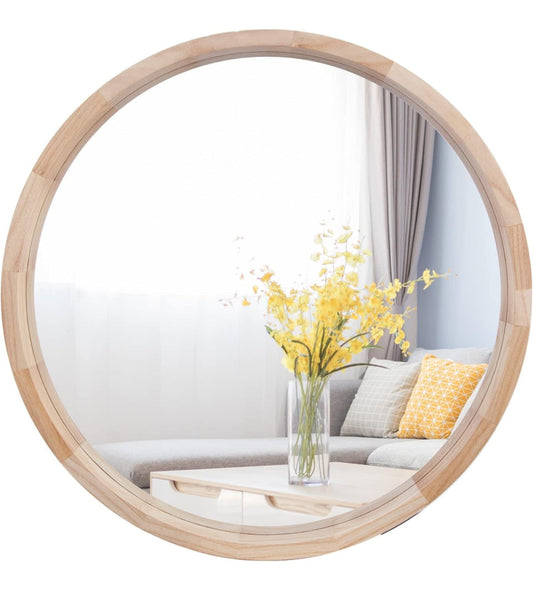 CONGUILIAO Round Mirror 30-inch natural wood frame wall mirror reflecting bright living room interior with yellow flowers and sofa