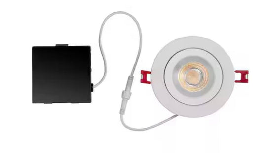 Commercial Electric Ultra Spot 4-inch round adjustable color temperature LED canless recessed light with white trim and integrated driver.