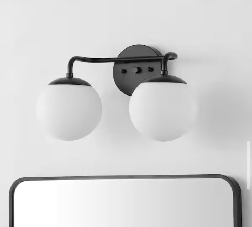 JONATHAN Y Louis Parisian Globe 15 in. 2-Light Metal/Frosted Glass Modern Contemporary LED Vanity Light, Black