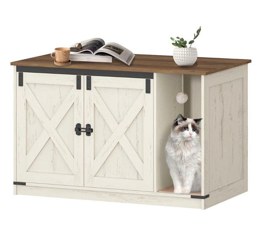 Rustic cat litter box enclosure cabinet with barn door design and cat playing inside corner compartment