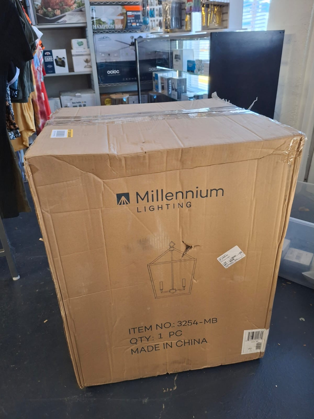Open box Millennium Lighting 3254-MB 4-Light 20 in. Wide Taper Candle Matte Black