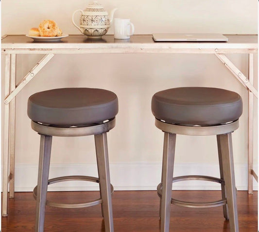 Three Posts Gadberry Swivel black bar stools set of 2 with steel frame and faux leather seats