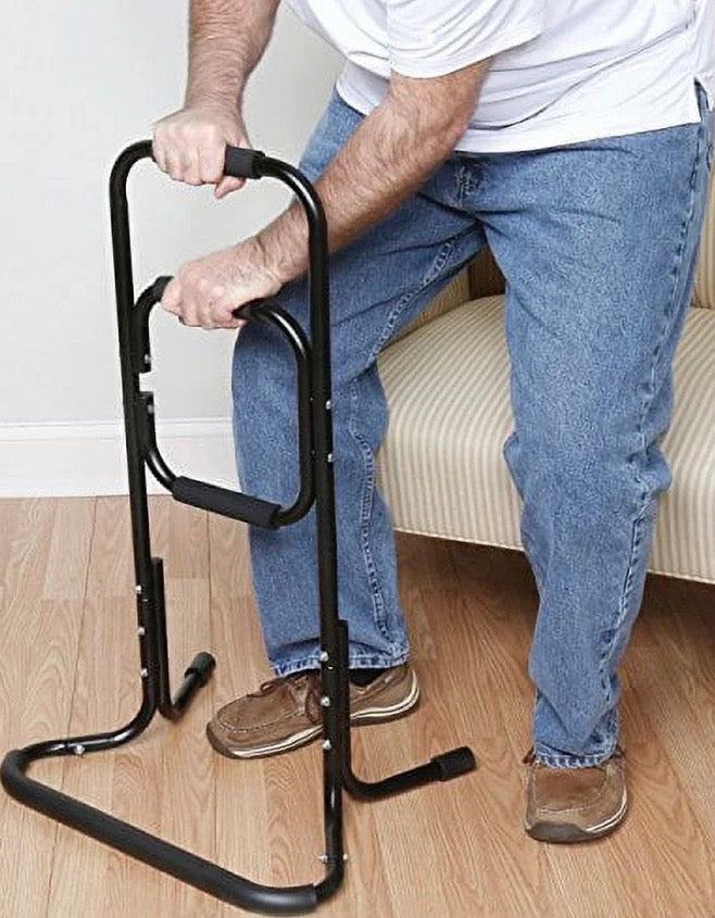 Bandwagon Chair Stand Assist portable black metal frame with padded handles helping elderly rise from chair or sofa
