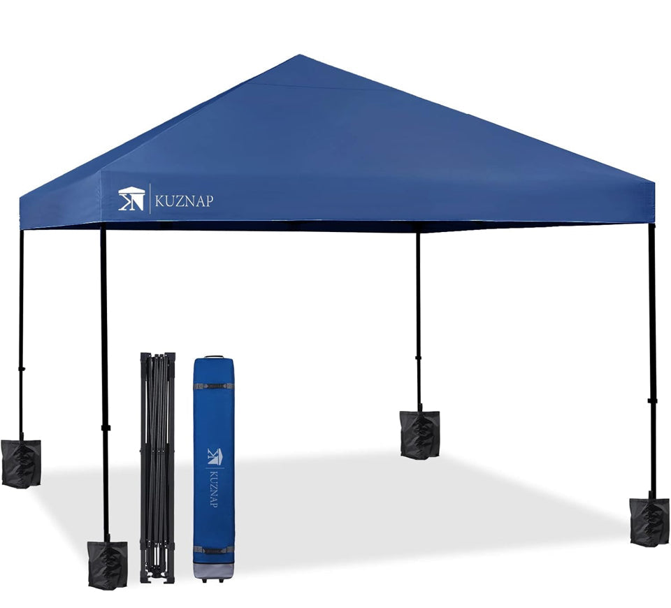 KUZNAP 12'x12' pop-up canopy tent with wheeled carry bag, sandbags, and stakes for easy setup.