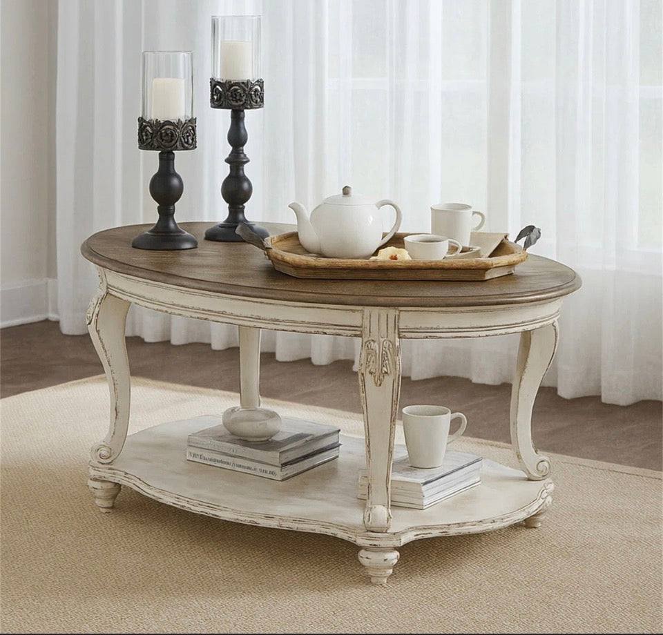 Kelly Clarkson Home Hayley single oval coffee table with two-tone antique white and distressed wood finish and cabriole legs
