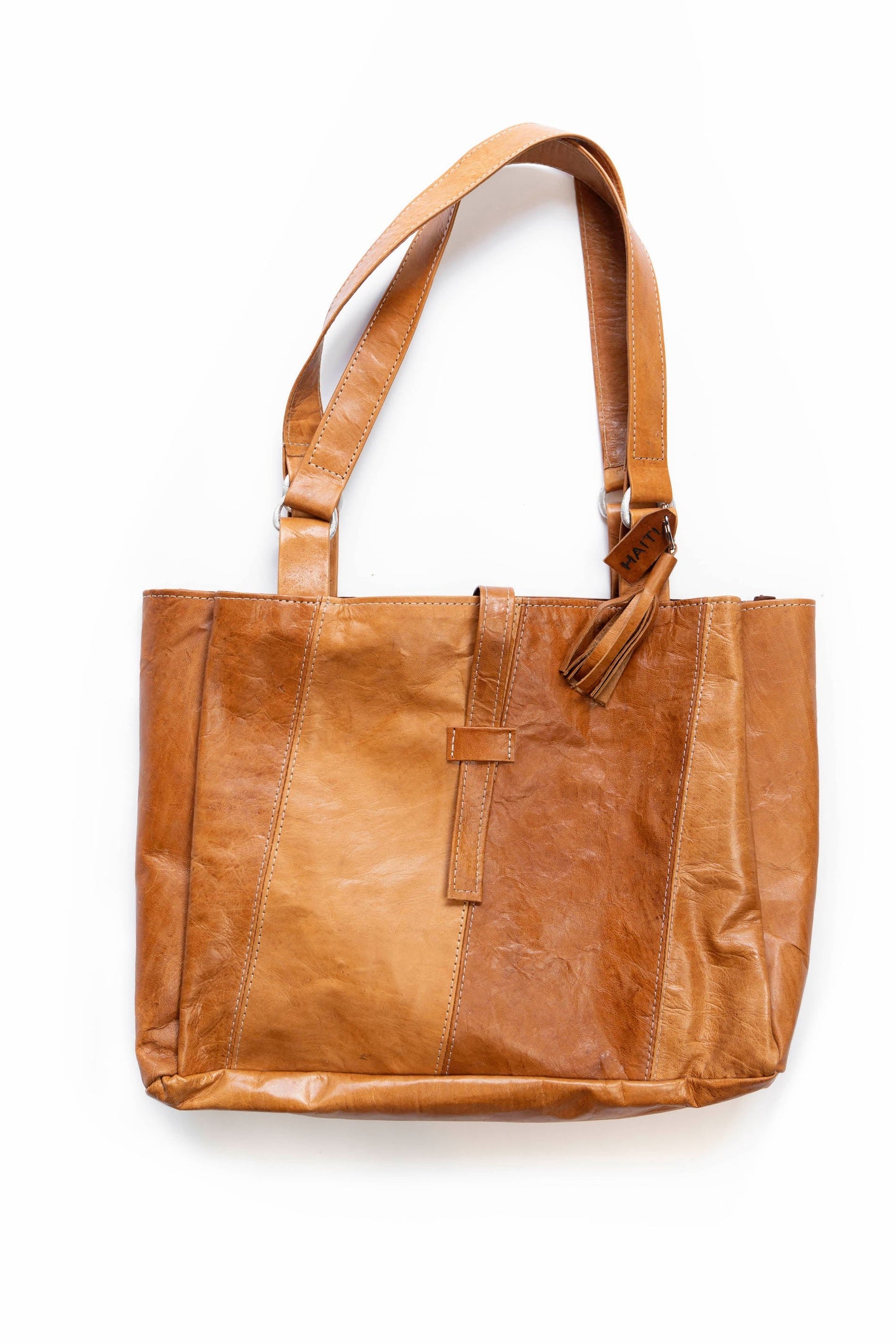Brown full-grain leather marriage two in one tote bag with dual-tone design and shoulder straps