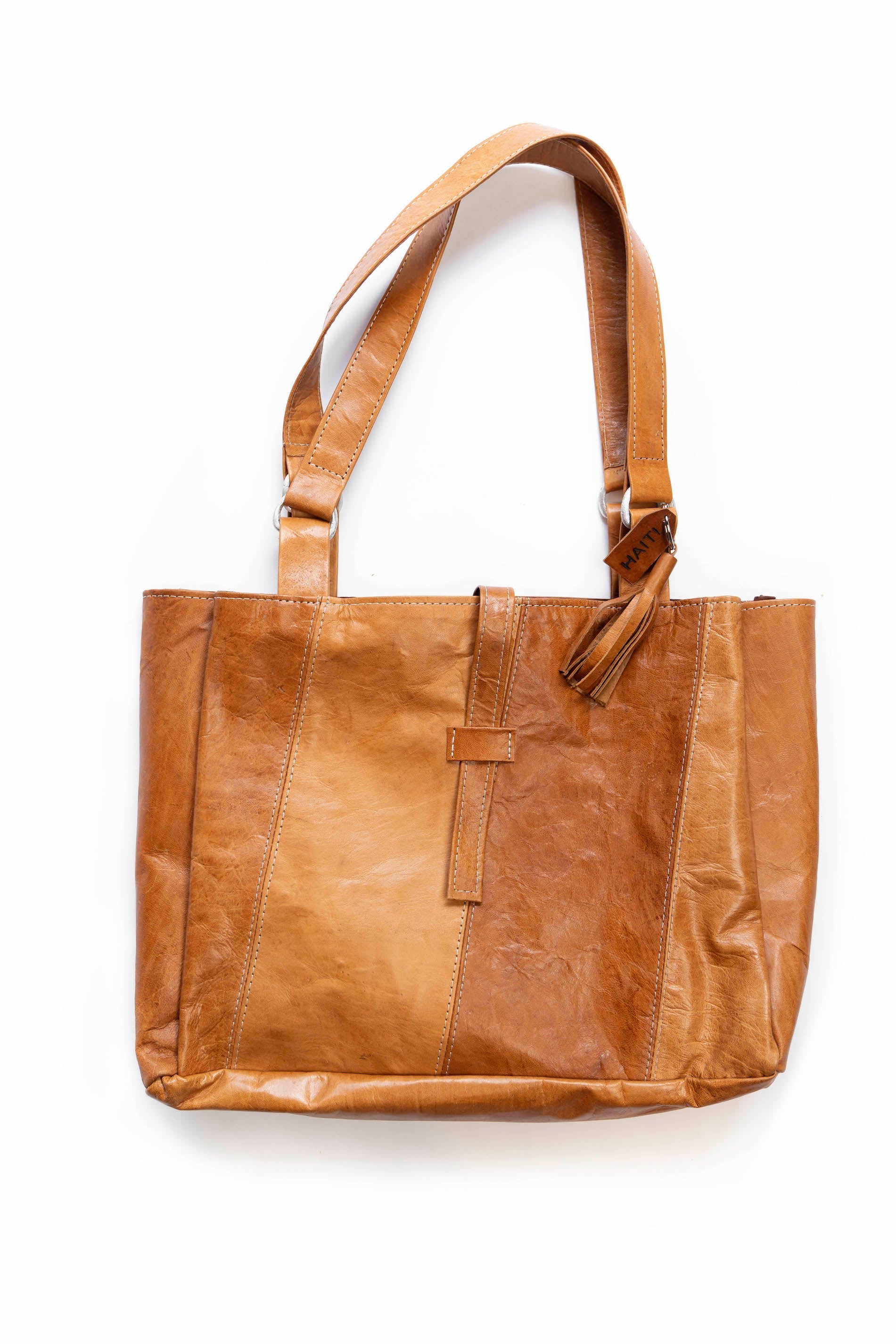 Brown full-grain leather marriage two in one tote bag with dual-tone design and shoulder straps