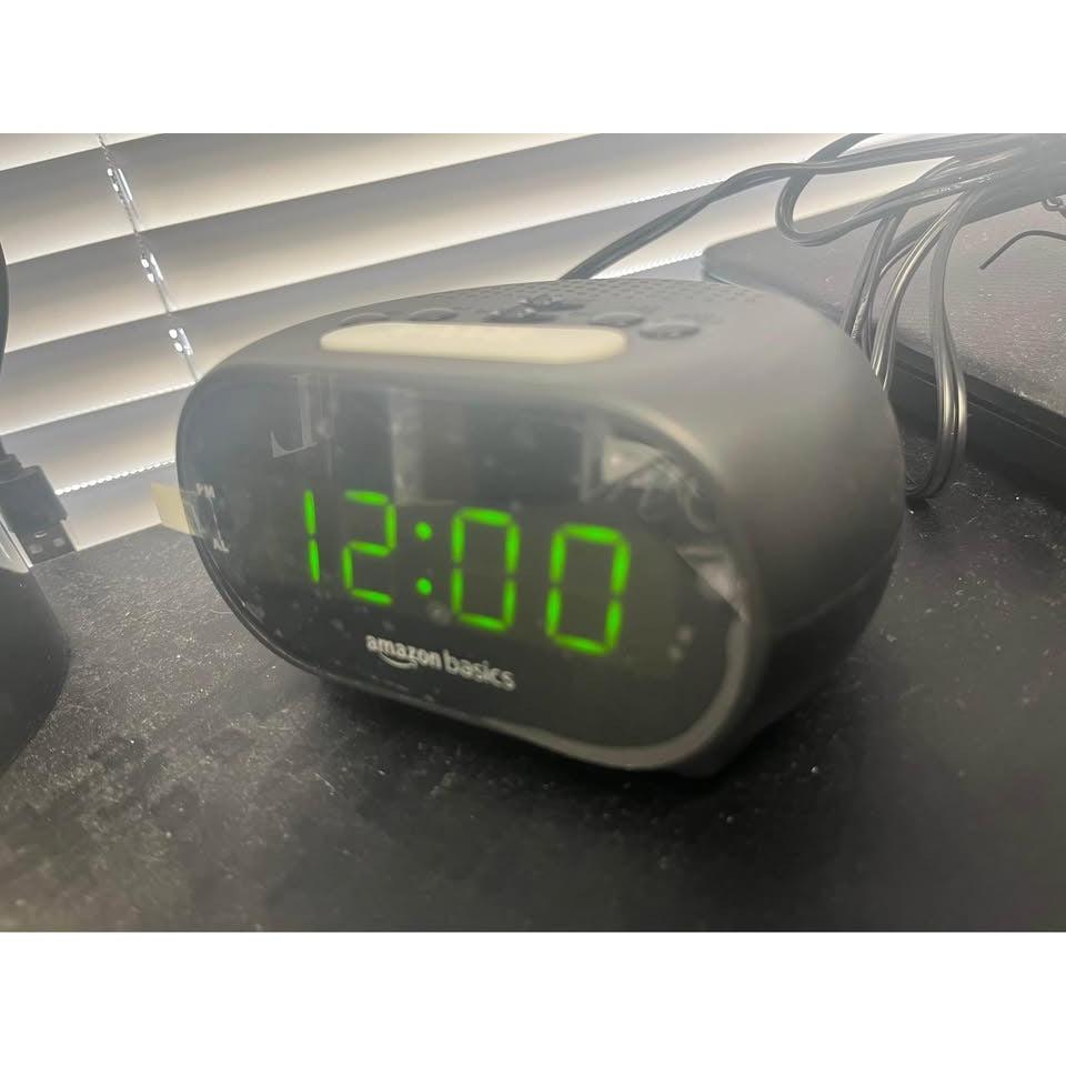 Amazon Basics Small Digital Oval Alarm Clock with LED Display, Nightlight, Snooze Function & Battery