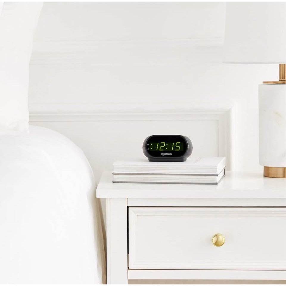 Amazon Basics Small Digital Oval Alarm Clock with LED Display, Nightlight, Snooze Function & Battery