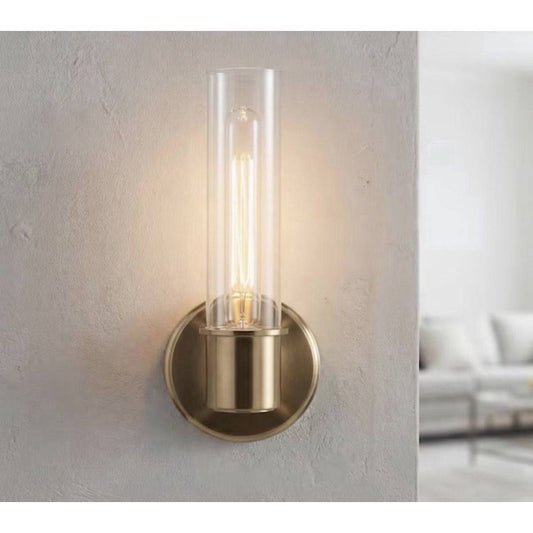 Kichler Aviv 1-Light Wall Sconce in champagne bronze with clear glass cylindrical shade