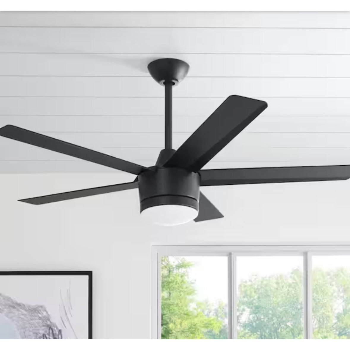Merwry 52 in. Matte Black Ceiling Fan with integrated LED light and remote control in modern indoor setting