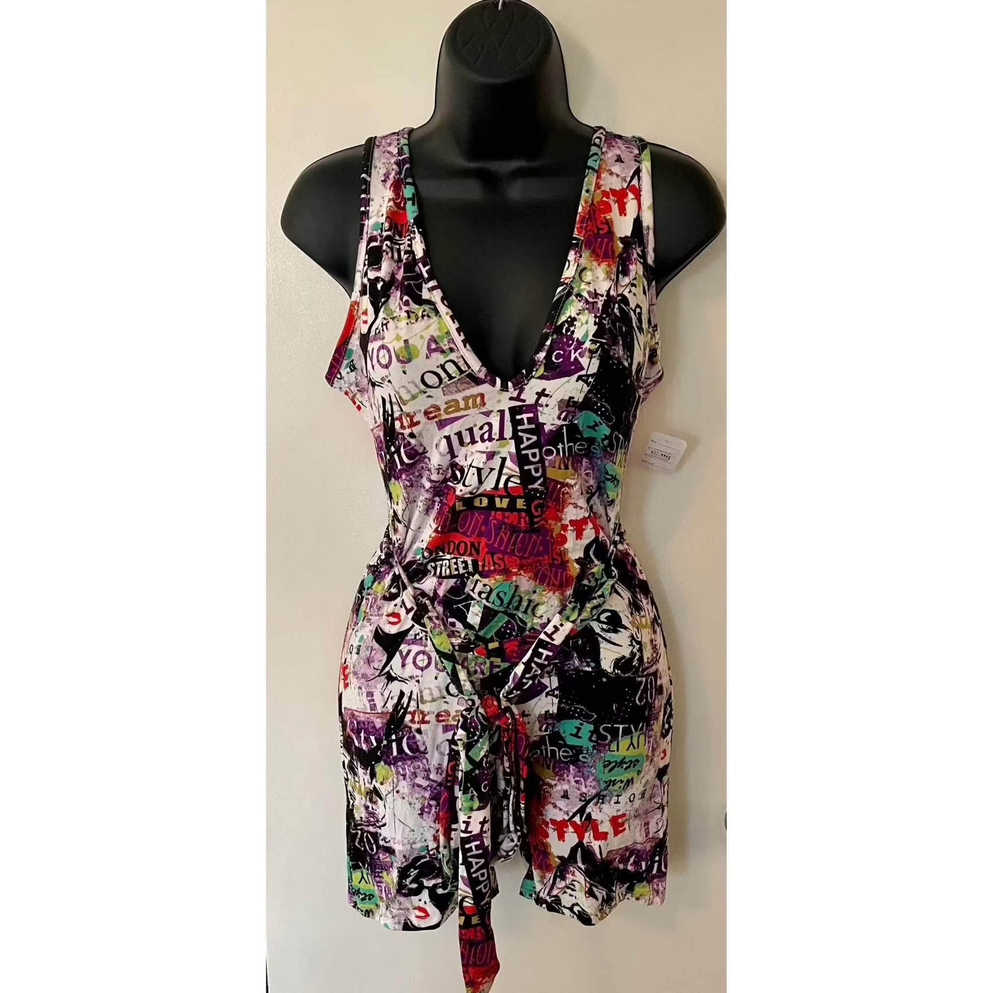 Colorful dodo romper with graphic print, new with tags.