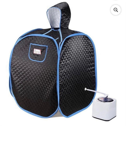 Black foldable sauna with blue trim and attached steam boiler for half-body steam therapy