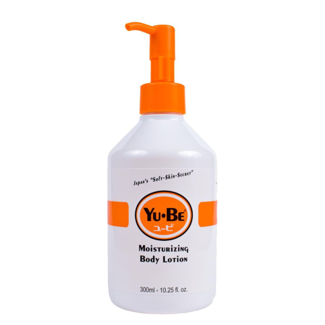 Yu-Be Moisturizing Body Lotion in white bottle with orange pump, hydrating non-greasy formula for dry skin relief.