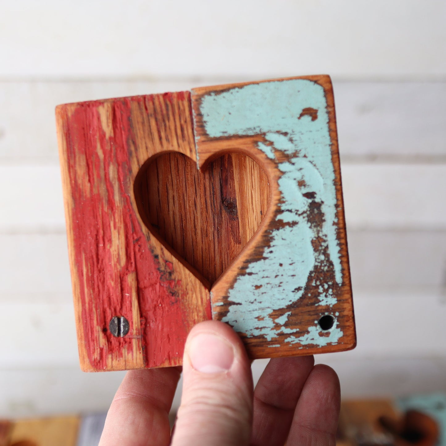 Handmade Rustic Heart Tiles made of reclaimed wood with a heart cut-out and distressed red and blue paint finish