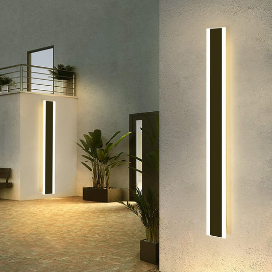 Daoseolo Outdoor Wall Sconces illuminating a modern building exterior with warm light; minimalist design and IP65 waterproof feature.