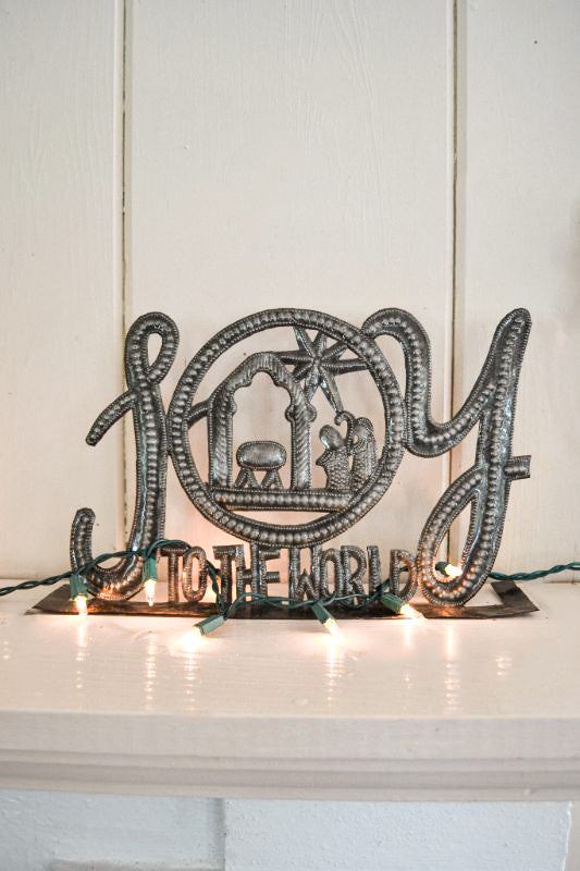 Joy to the World standing metal art featuring Nativity scene crafted from recycled steel drums, 12x7.5 inches.