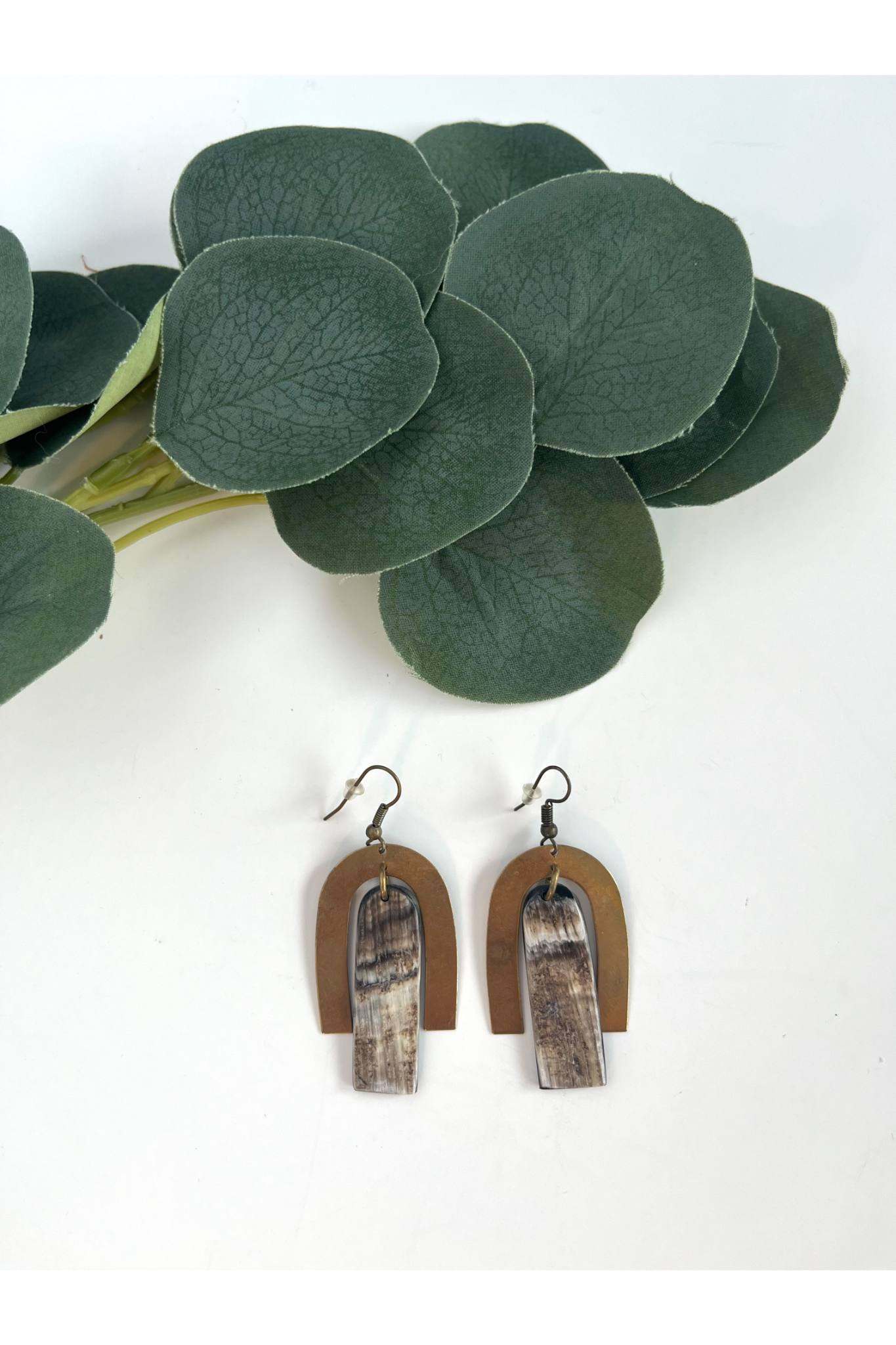 Handcrafted Rainbow Earring made from bone and brass, 2.5 inches long, featuring a unique artisan design.