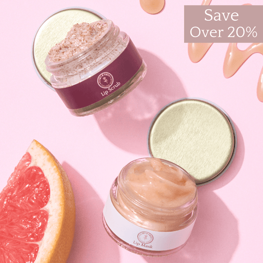 Lip Kit Duo with lip scrub and lip mask jars on pink background with grapefruit slice and "Save Over 20%" text.