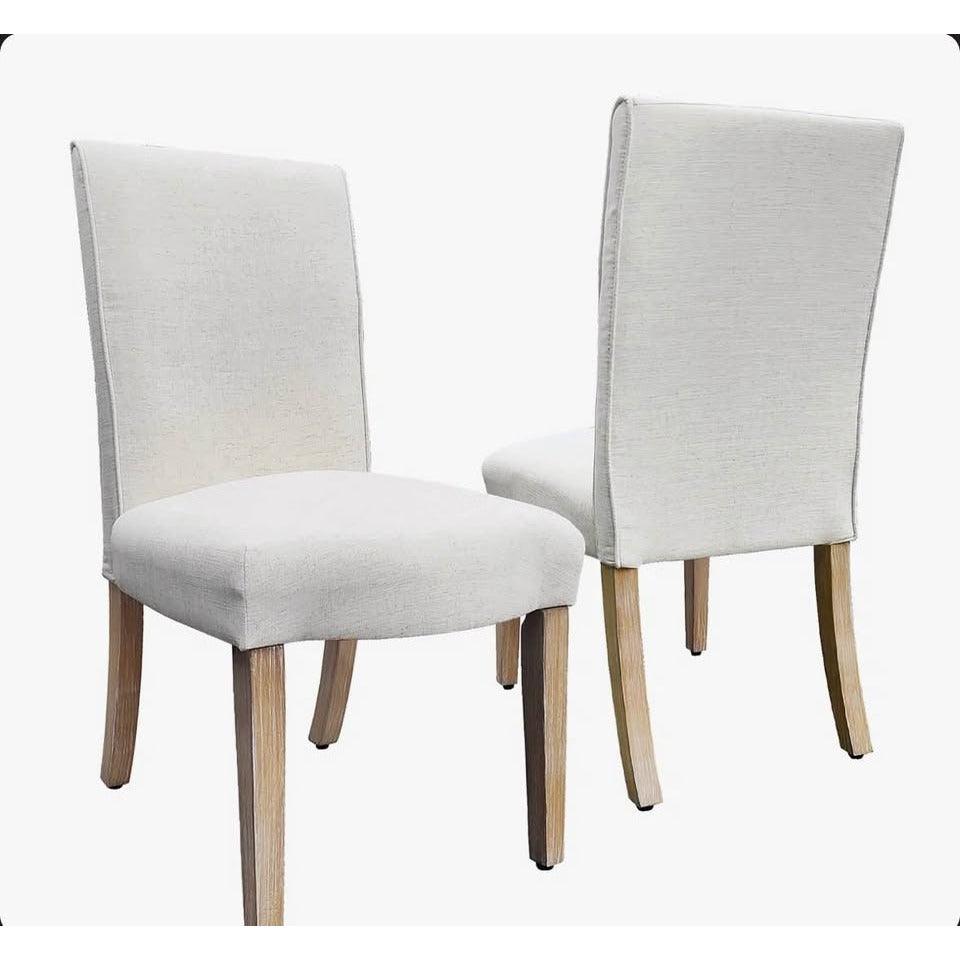 Set of 2 Arvad 19.7'' H upholstered dining chairs in cream with scalloped seat and wood legs