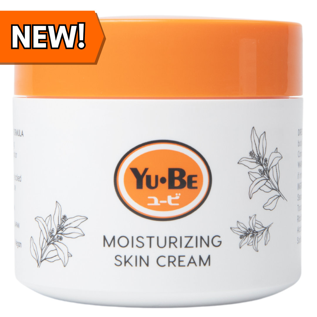 Yu-Be Moisturizing Skin Cream 4.4 oz jar with orange lid and botanical illustrations, new product badge