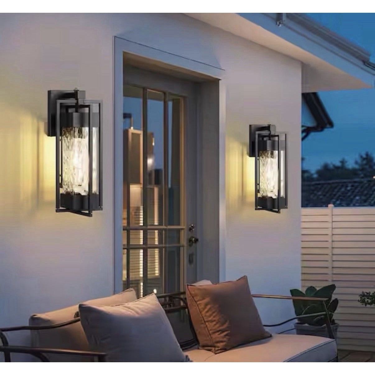 Rottogoon dusk to dawn outdoor wall light with textured glass and black metal frame illuminating a porch area