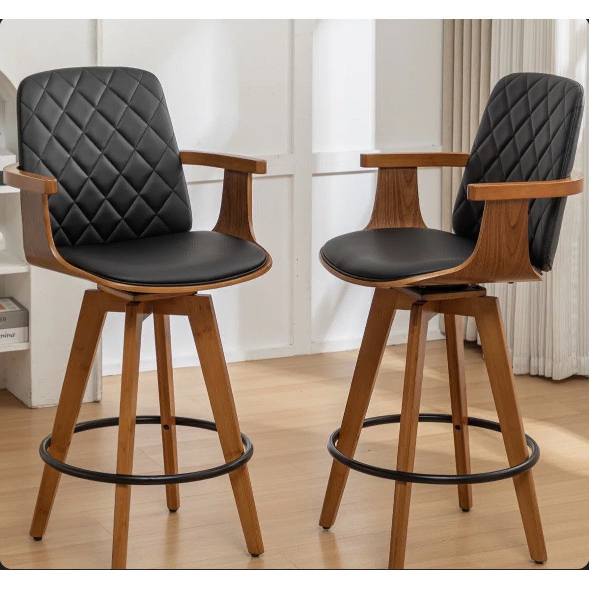 Set of 2 Sitaram Swivel Bar Stools with 360-degree swivel and modern black and brown design by Corrigan Studio