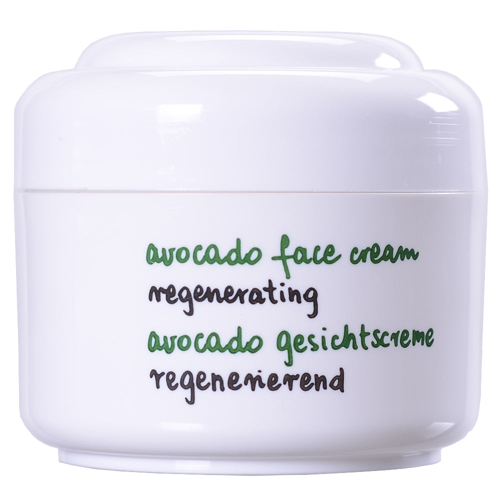 white jar of avocado oil face cream for moisturizing and regenerating dry dull skin